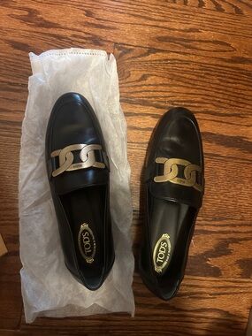 Tod's shoes Worn once with Logo.